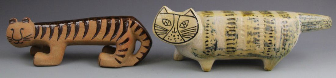 (2) LISA LARSON GUSTAVSBERG CERAMIC CATS: (2) LISA LARSON GUSTAVSBERG CERAMIC CATS Pair of modern ceramic cats Lisa Larson for Swedish porcelain company Gustavsberg. Brown with glazed stripes, 10.5 x 3.5"; and grey with blue, green, and yello