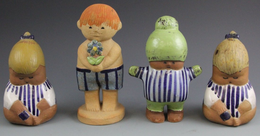 (4) LISA LARSON FIGURES FOR GUSTAVSBERG: (4) LISA LARSON FIGURES FOR GUSTAVSBERG Lot of four child figures by ceramist Lisa Larson for Swedish porcelain company Gustavsberg. Includes "Kalle" (7"), pair of "Johanna" (6") and "Adam" (8"). All