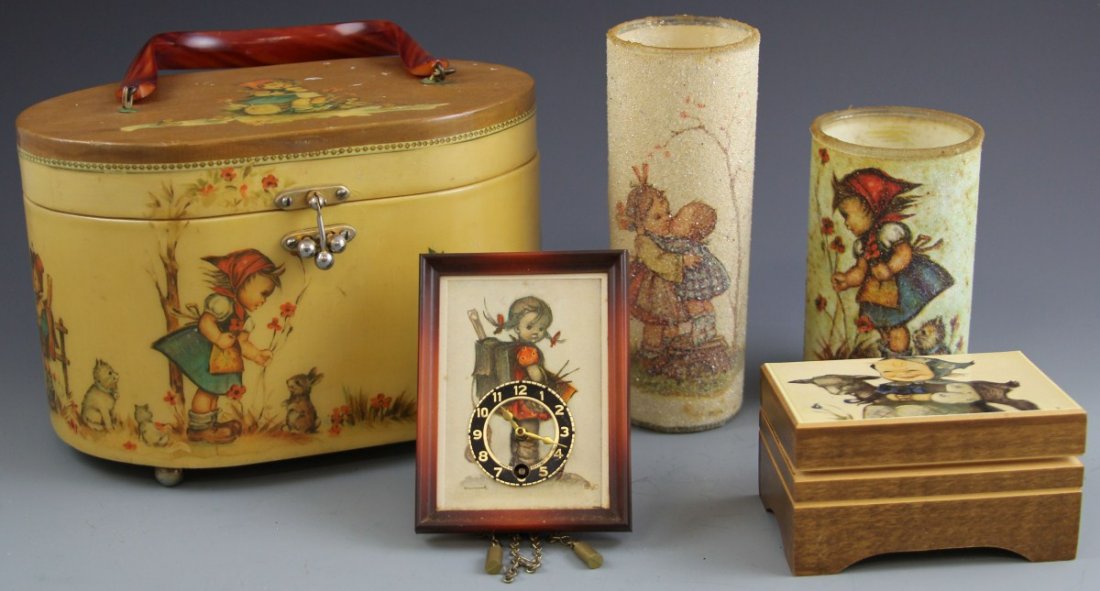 (5) MISCELLANEOUS HUMMEL ITEMS: (5) MISCELLANEOUS HUMMEL ITEMS Lot of five miscellaneous items including a Goebel Hummel miniature mechanical clock with key, 4.25 x 1.5", has conditional issues. Reuge music box depicting smiling gir