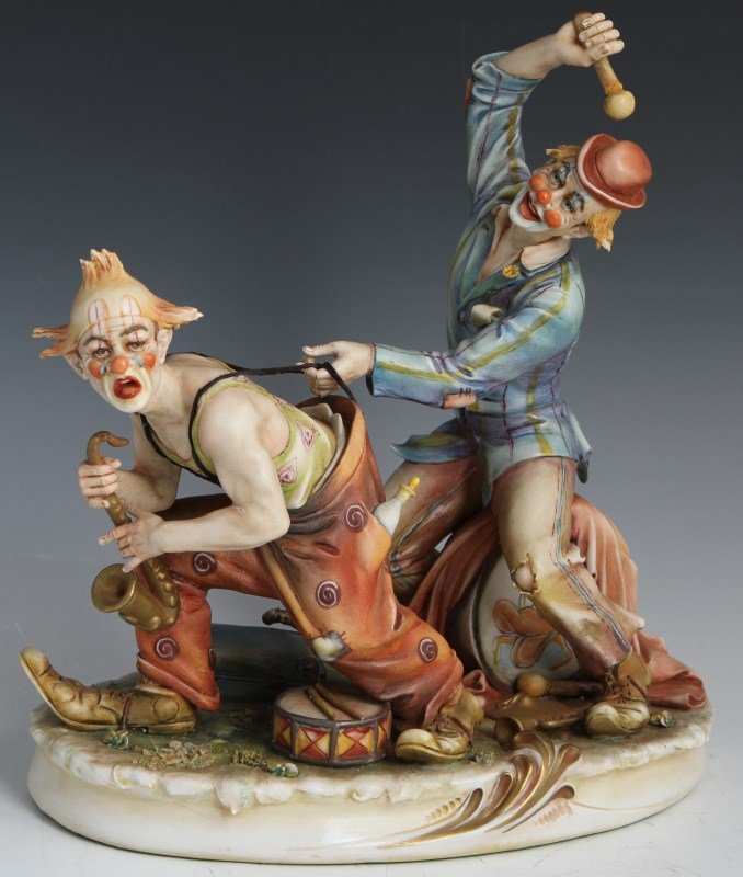 BORSATO PAGLIACCI SIGNED PORCELAIN FIGURE: BORSATO PAGLIACCI SIGNED PORCELAIN FIGURE Porcelain figure by Antonio Borsato, made in Italy. Pagliacci, #1040. Pagliacci is the Italian word for clowns. Figure is signed and stamped on the bottom. Si