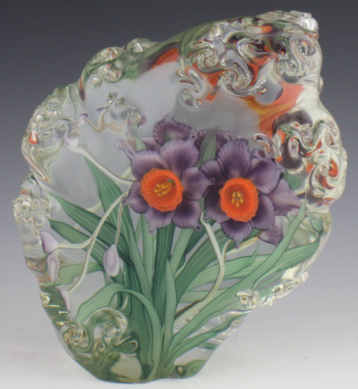 JUSTIN LUNDBERG LARGE PAPERWEIGHT ART GLASS 1/1: JUSTIN LUNDBERG LARGE PAPERWEIGHT ART GLASS 1/1 Justin Lundberg 2005 One-of-a-kind glass "Sketch" sculpture of encased purple and orange daffodils blooming inside a freeform clear glass stone with sma