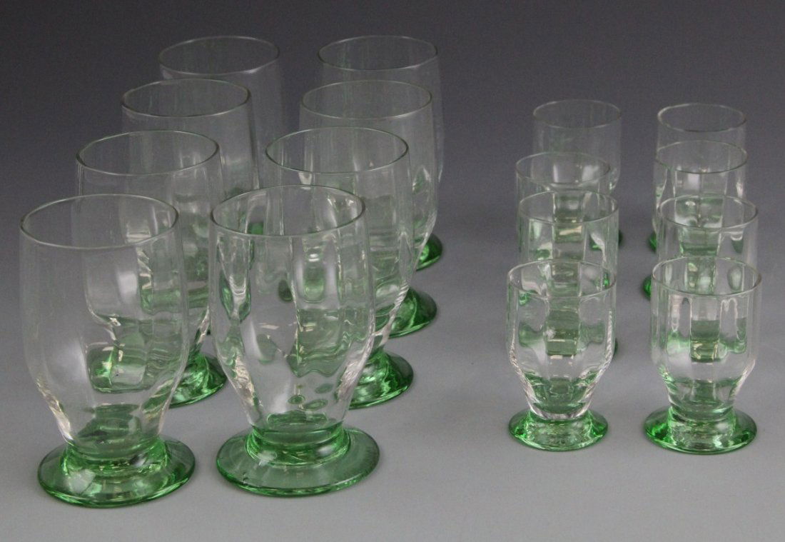 (16) GREEN VASELINE DAUM NANCY GLASS SET: (16) GREEN VASELINE DAUM NANCY GLASS SET Lot of sixteen Daum Nancy green vaseline/uranium cordial and shot glass set, French. Maker's mark on underside. Size: 2.25" - 3.375"