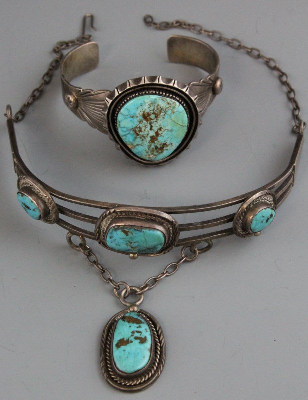 STERLING TURQUOISE NECKLACE & BRACELET SET: STERLING TURQUOISE NECKLACE & BRACELET SET Sterling choker style necklace with four pieces of turquoise, surrounded by a simple setting, and one cuff style bracelet with one large piece of turquoise.