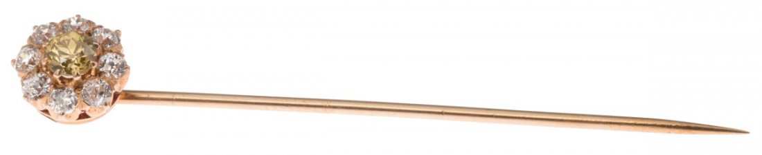 14K GOLD CANARY YELLOW DIAMOND FLORAL STICK PIN: 14K GOLD CANARY YELLOW DIAMOND FLORAL STICK PIN Ladies 14K yellow gold stick pin with diamond flower. Center round canary diamond of approximately 0.4 ct, surrounded by eight round cut white diamonds 