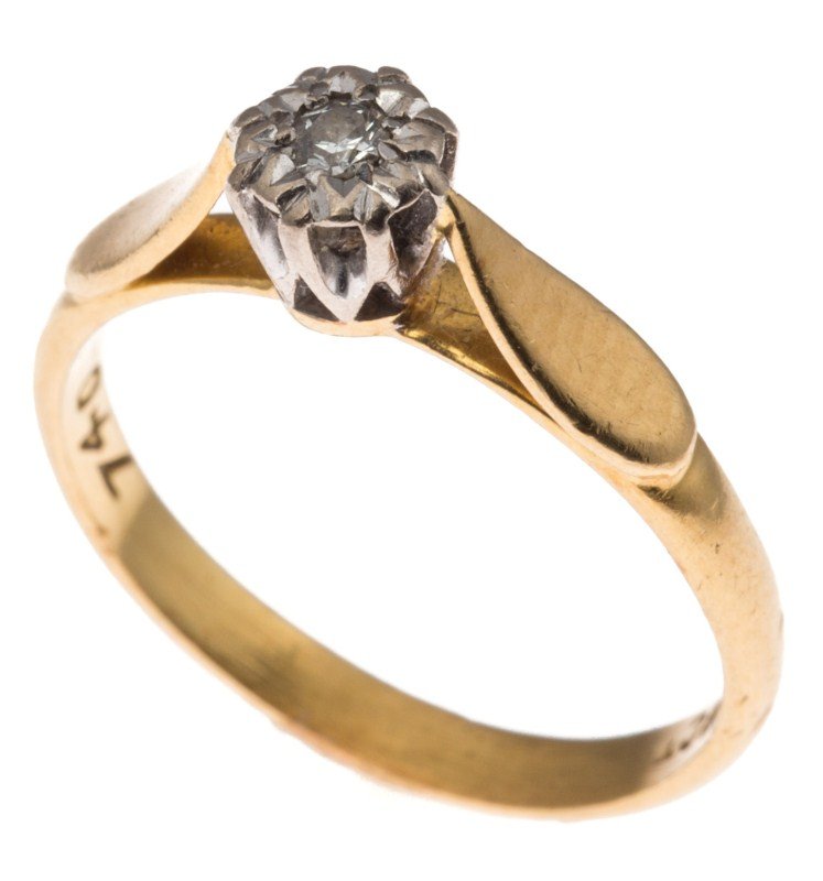 LADIES 18K GOLD DIAMOND SOLITAIRE ENGAGEMENT RING: LADIES 18K GOLD DIAMOND SOLITAIRE ENGAGEMENT RING An 18K yellow gold solitaire diamond engagement ring. 0.05 ct diamond set in white gold, yellow gold band. Weight: 2.3g Size: 5.25