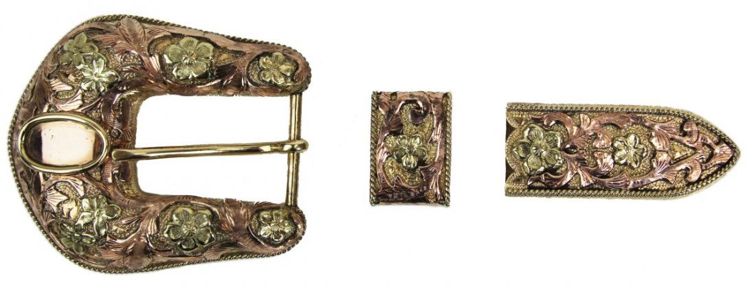 EDWARD H BOHLIN 18K GOLD 3-PIECE BELT BUCKLE: EDWARD H BOHLIN 18K GOLD 3-PIECE BELT BUCKLE Highly decorated solid 18K gold belt buckle by Edward Bohlin. Yellow and rose gold flower and scroll leaf design. 3 piece belt buckle. Stamped "Edward H. B