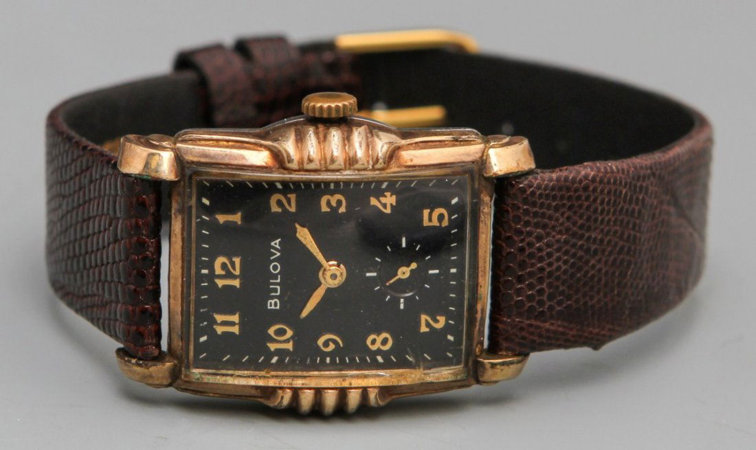 BULOVA 1952 MANUAL WRISTWATCH: BULOVA 1952 MANUAL WRISTWATCH Bulova 21 Jewel 1952 Manual Wristwatch,10K rolled gold plate bezel stainless steel back case no.5074806, 10BM movement, gold toned hour,minute hands, gold toned art deco