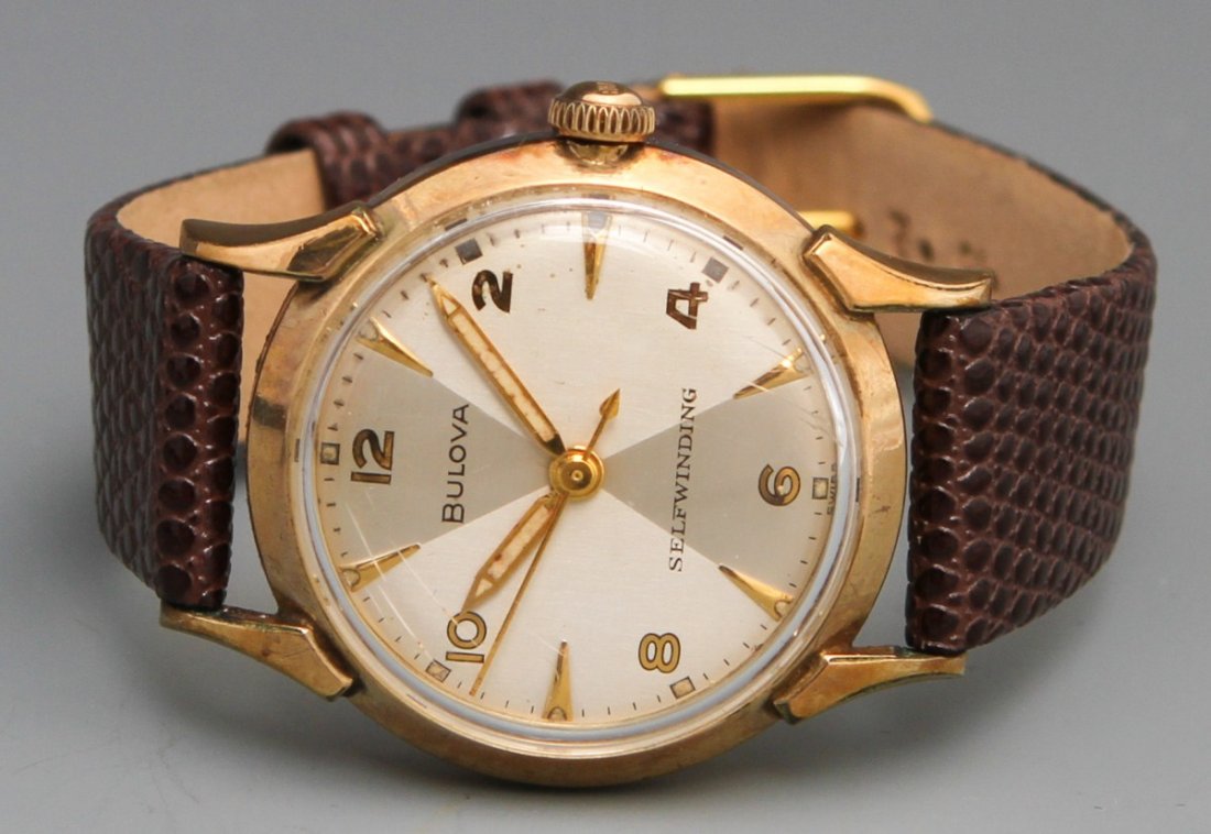 BULOVA 1959 SELFWINDING WRISTWATCH: BULOVA 1959 SELFWINDING WRISTWATCH Bulova 1959 Selfwinding Automatic Wristwatch, 10K rolled gold plated bezel stainless steel back, serial no. E051589, gold toned hour, minute hands, gold toned art de