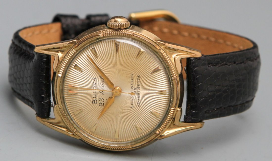 BULOVA 1955 SELFWINDING WRISTWATCH: BULOVA 1955 SELFWINDING WRISTWATCH Bulova 23 Jewel 1958 Selfwinding Wristwatch,10K rolled gold plate stainless steel back case no.A555959, 10BPAC movement, gold toned hour, minute hands, gold toned ba