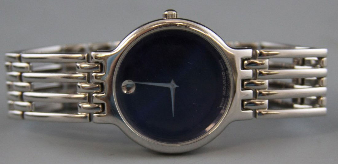 MOVADO ESPERANZA BLUE DIAL WRISTWATCH: MOVADO ESPERANZA BLUE DIAL WRISTWATCH Movado Esperanza blue dial wristwatch #604122, Stainless steel case, polished stainless steel bracelet, Signature open link bracelet, Museum blue dial color, Crys