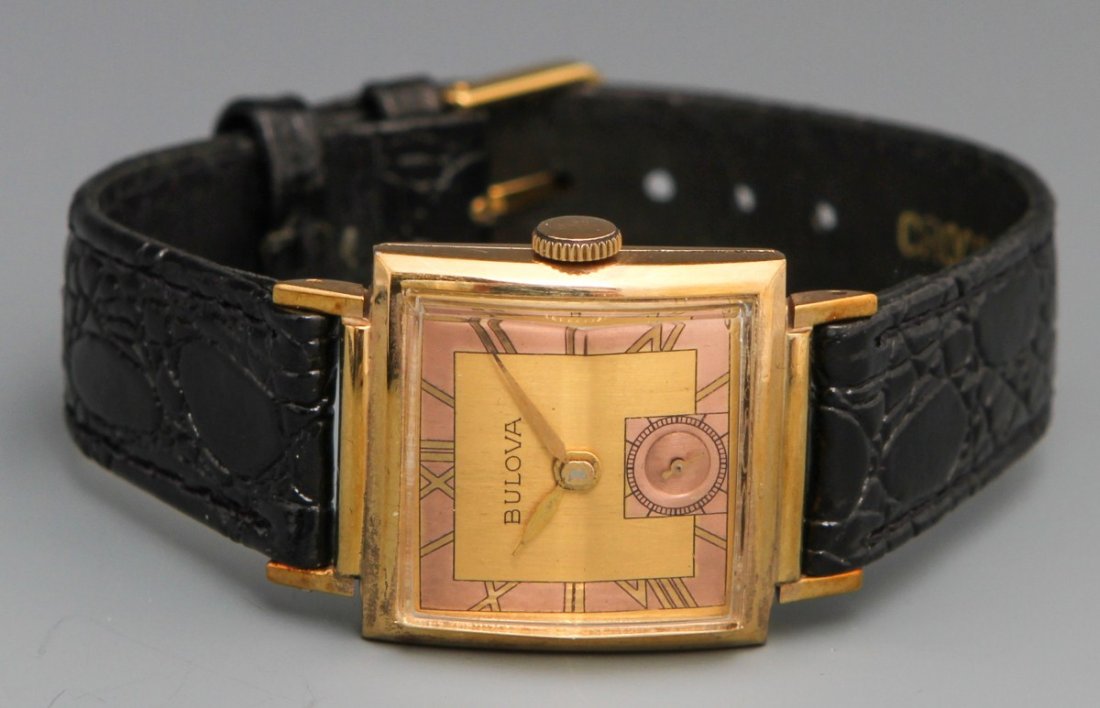 BULOVA 1940 BEACON MANUAL WRISTWATCH: BULOVA 1940 BEACON MANUAL WRISTWATCH Bulova 1940 Beacon 21 Jewel Manual Wristwatch, 10K gold filled case, 10AX movement, serial no 0676931, gold toned hour, minute hands, gold toned art deco roman num