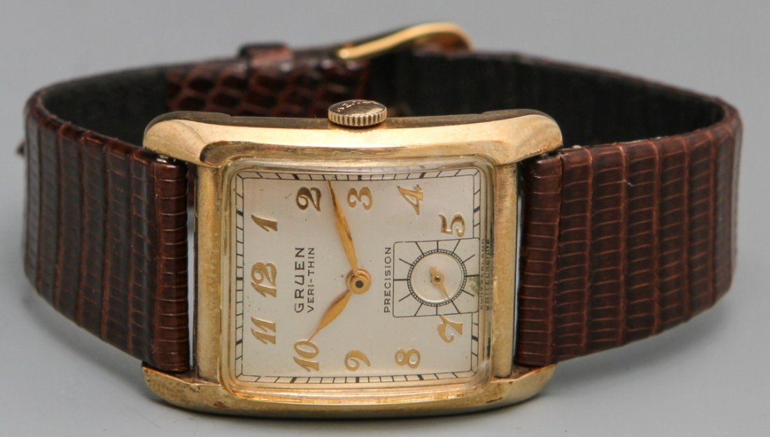 GRUEN VERI-THIN PRECISION WRISTWATCH: GRUEN VERI-THIN PRECISION WRISTWATCH Men's Gruen Veri-thin 17J Precision Wristwatch,Model 425; serial no.B354976; unadjusted, in a 10K gold filled case. Silver-toned dial; gold-toned hands, numbers an