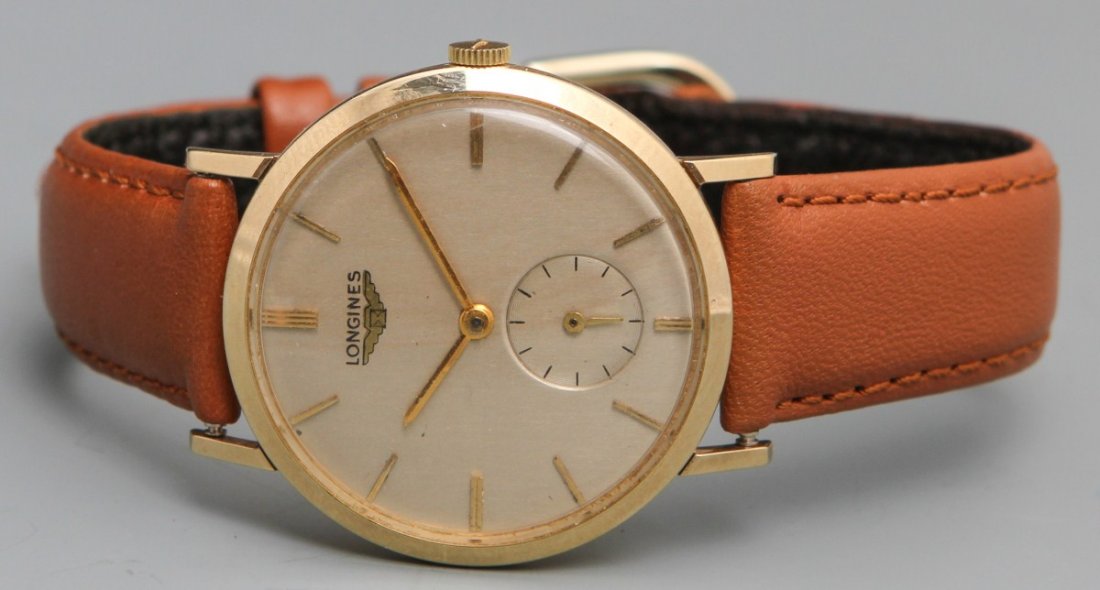 LONGINES 1957 MANUAL WRISTWATCH: LONGINES 1957 MANUAL WRISTWATCH Longines men's 1957 manual wristwatch, 17 jewel unadjusted 23Z movement, 10K gold filled case by Schwab & Wuischpard case no. 628856, serial no. 10397590, gold toned ba