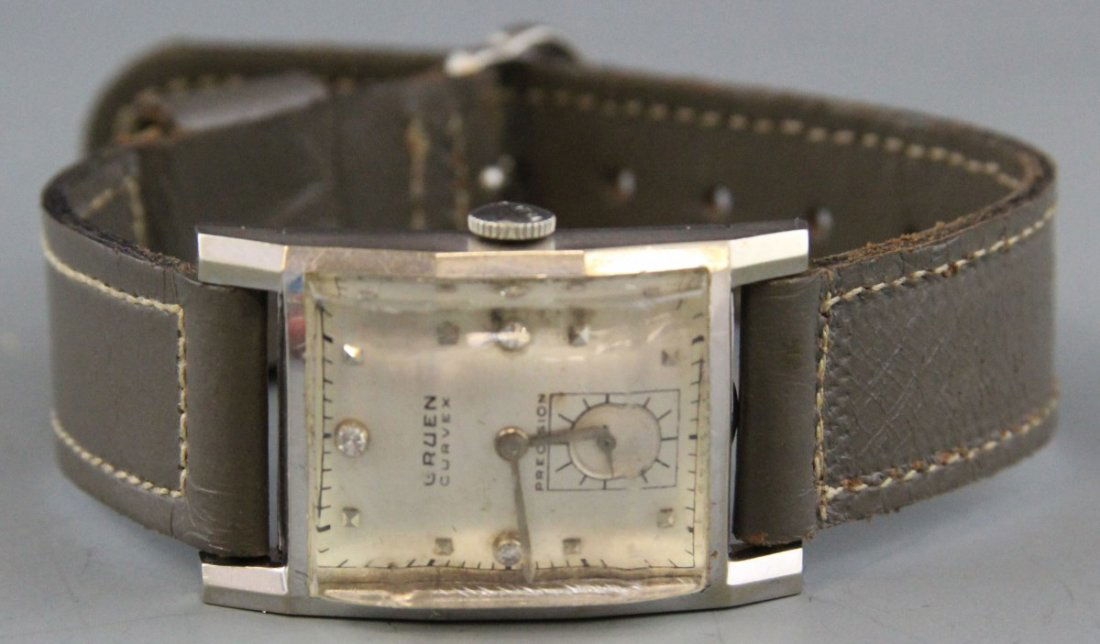 14K GRUEN CURVEX PRECISION MANUAL WRISTWATCH: 14K GRUEN CURVEX PRECISION MANUAL WRISTWATCH Gruen Curvex Precision men's manual wristwatch, 14K white gold case no. U04963, silver toned stud and diamond numerals with second hand at 6 position. Silv