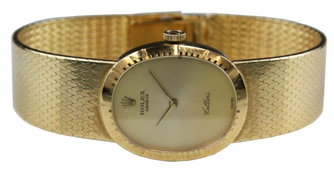 MENS 18K GOLD ROLEX CELLINI: MENS 18K GOLD ROLEX CELLINI Rolex Cellini. 18K yellow gold case and bracelet. Case is marked "4325" and "804 01 40". Serial number 6910159. Gold colored face with 18K gold baton hands. Montres Rolex S