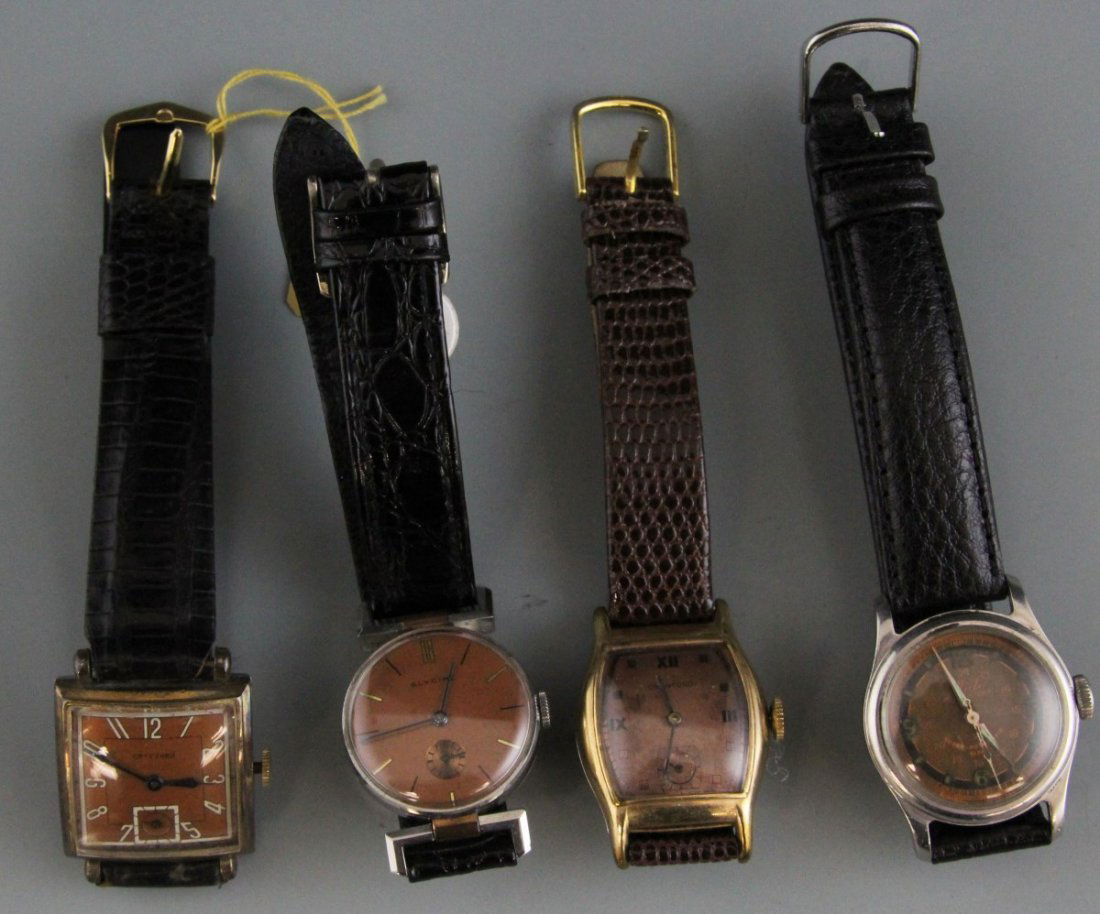 (4) VINTAGE MEN'S WRIST WATCHES: (4) VINTAGE MEN'S WRIST WATCHES Lot of four vintage men's wrist watches. Includes Two Crawford with "Brazilian Lizard" and genuine leather band, 8.5" and 8"; Mido multifort automatic with genuine leat