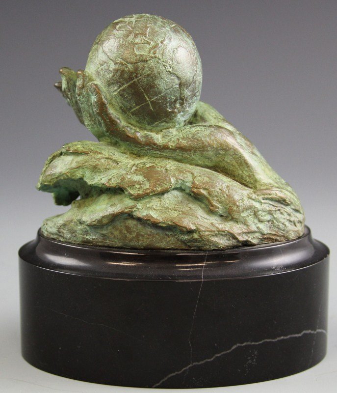 MARA DOMINIONI ROYAL CARIBBEAN MILLENNIUM BRONZE: MARA DOMINIONI ROYAL CARIBBEAN MILLENNIUM BRONZE Cast bronze sculpture by Mara Dominioni for Royal Caribbean International cruise line for their Millennium cruise. Features open hand holding a globe o