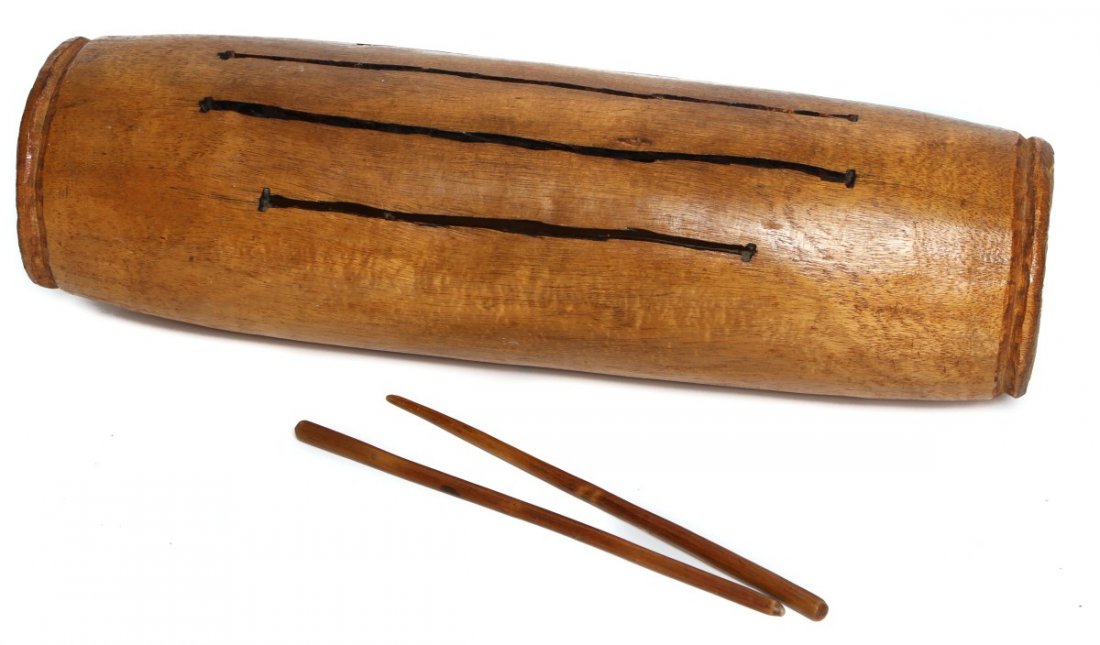 WEST AFRICAN KRIN DRUM: WEST AFRICAN KRIN DRUM The Krin, also called kolokolos or commonly “slit drum,” originates from the Forest Region of Guinea, West Africa. This Krin drum has four slits and two drum sticks. Size: 2