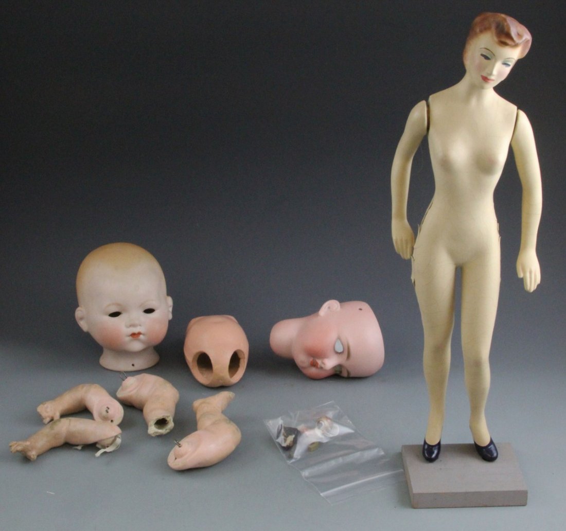 (2) GERMAN ARMAND MARSEILLE DOLL HEADS AND PARTS: (2) GERMAN ARMAND MARSEILLE DOLL HEADS AND PARTS A lot of two German Armand Marseille bisque doll heads, early 20th century. Also included is the body of a Latexture Products doll from New York City o