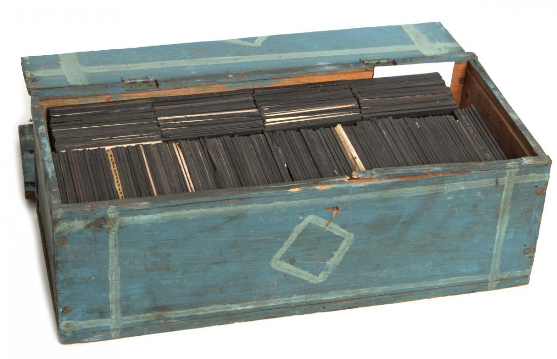 (192) MAGIC LANTERN GLASS SLIDES: (192) MAGIC LANTERN GLASS SLIDES Large mixed lot of 192 colored/ black & white magic lantern glass slides with antique storage box, circa late 19th/ early 20th C. Slides include an assortment of perso