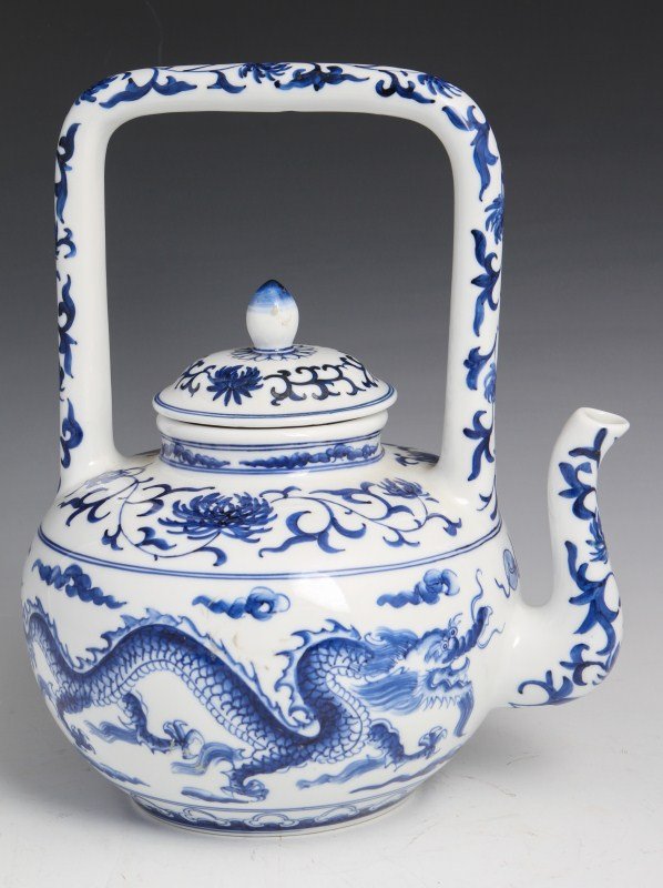 LARGE ASIAN BLUE AND WHITE PORCELAIN TEA POT