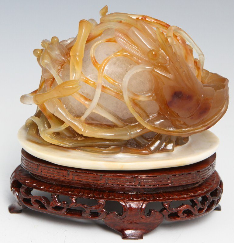 CHINESE STONE CARVING OF CRUSTACEAN WITH WOOD BASE