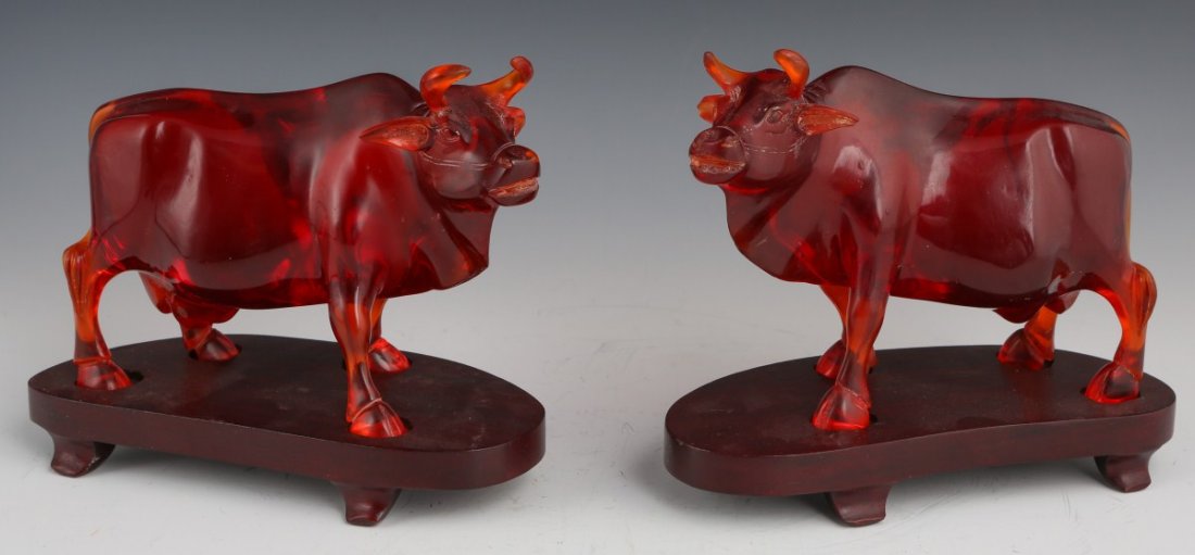 PAIR OF CHINESE CHERRY AMBER WATER BUFFALO