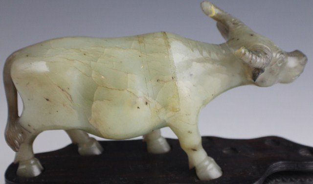 CHINESE CELADON GREEN CARVED FIGURE OF AN OX - 4