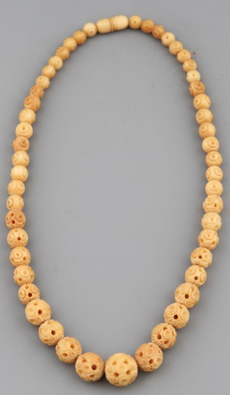 CARVED IVORY NECKLACE