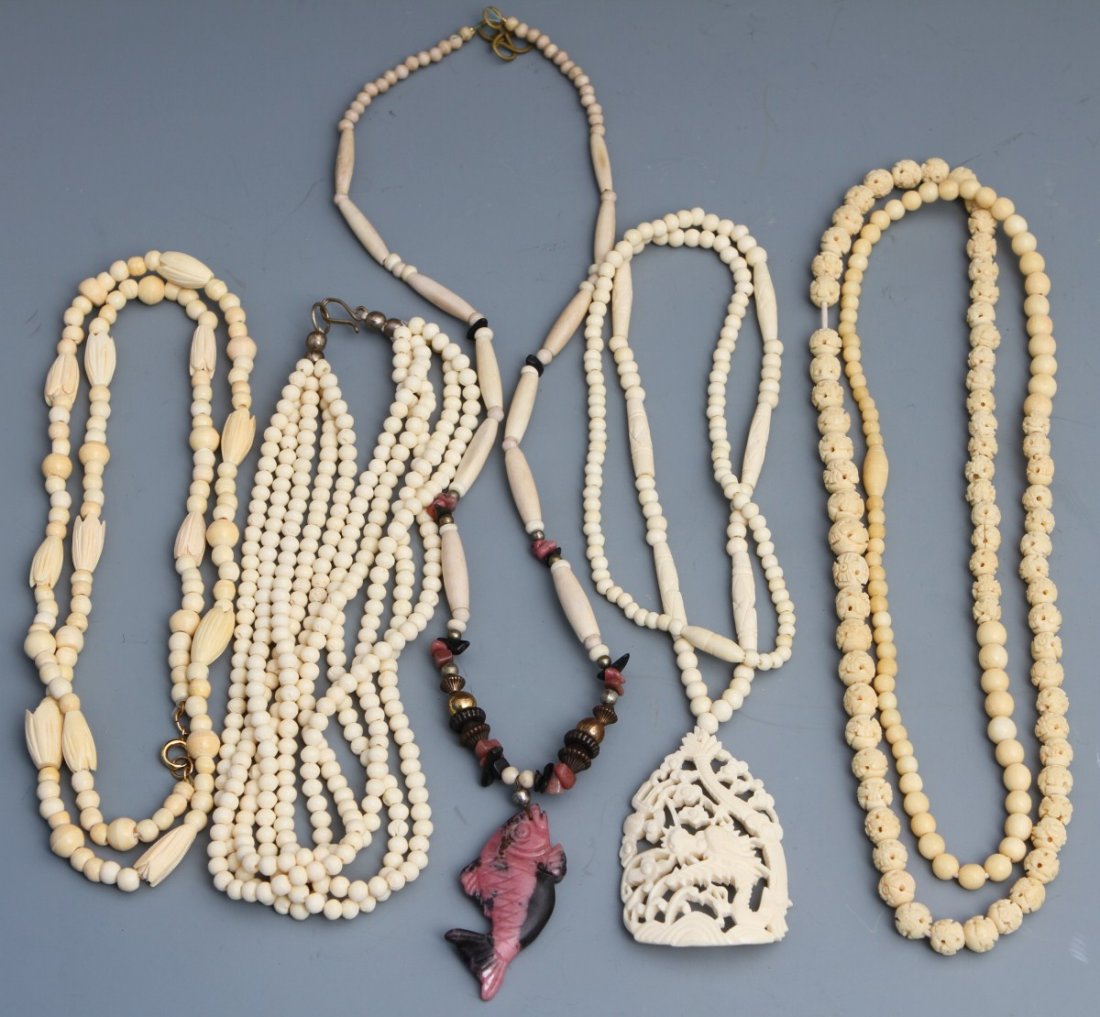 LARGE LOT OF BONE NECKLACES