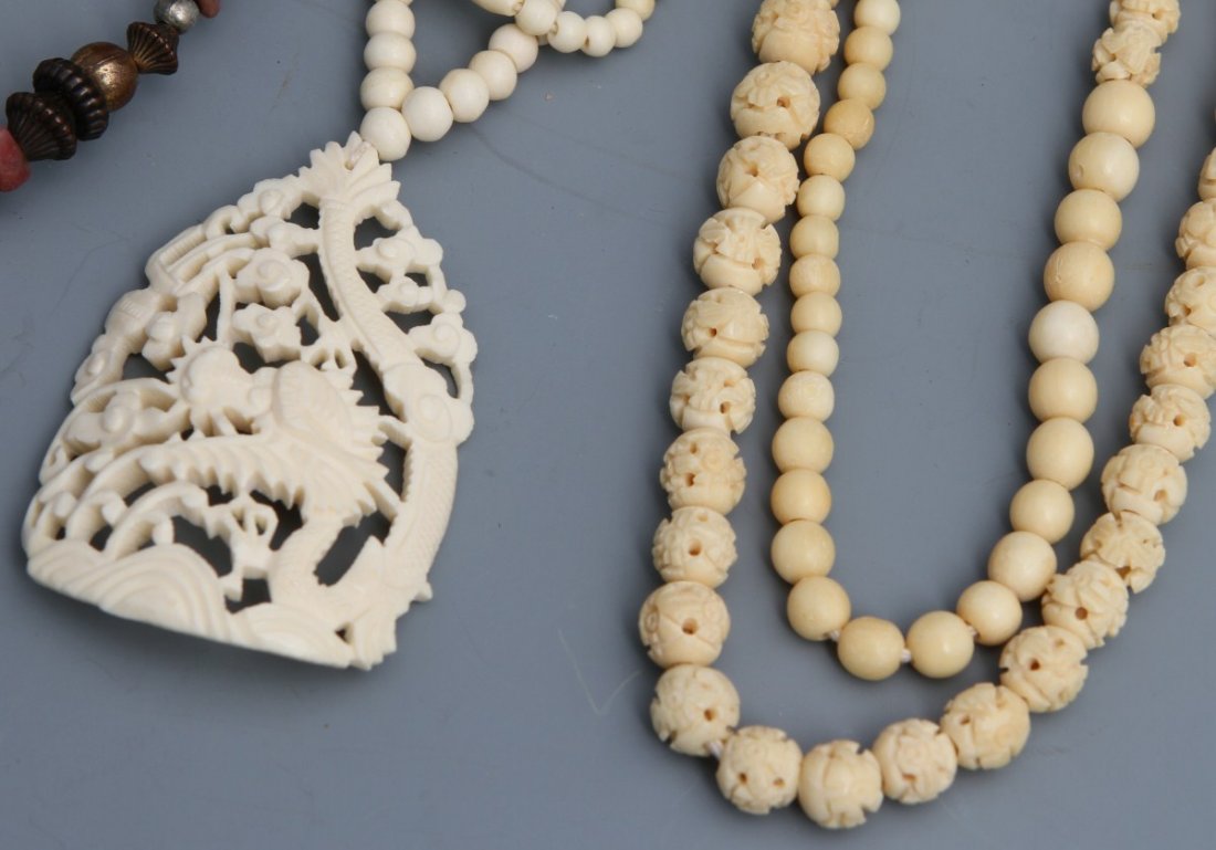 LARGE LOT OF BONE NECKLACES - 3