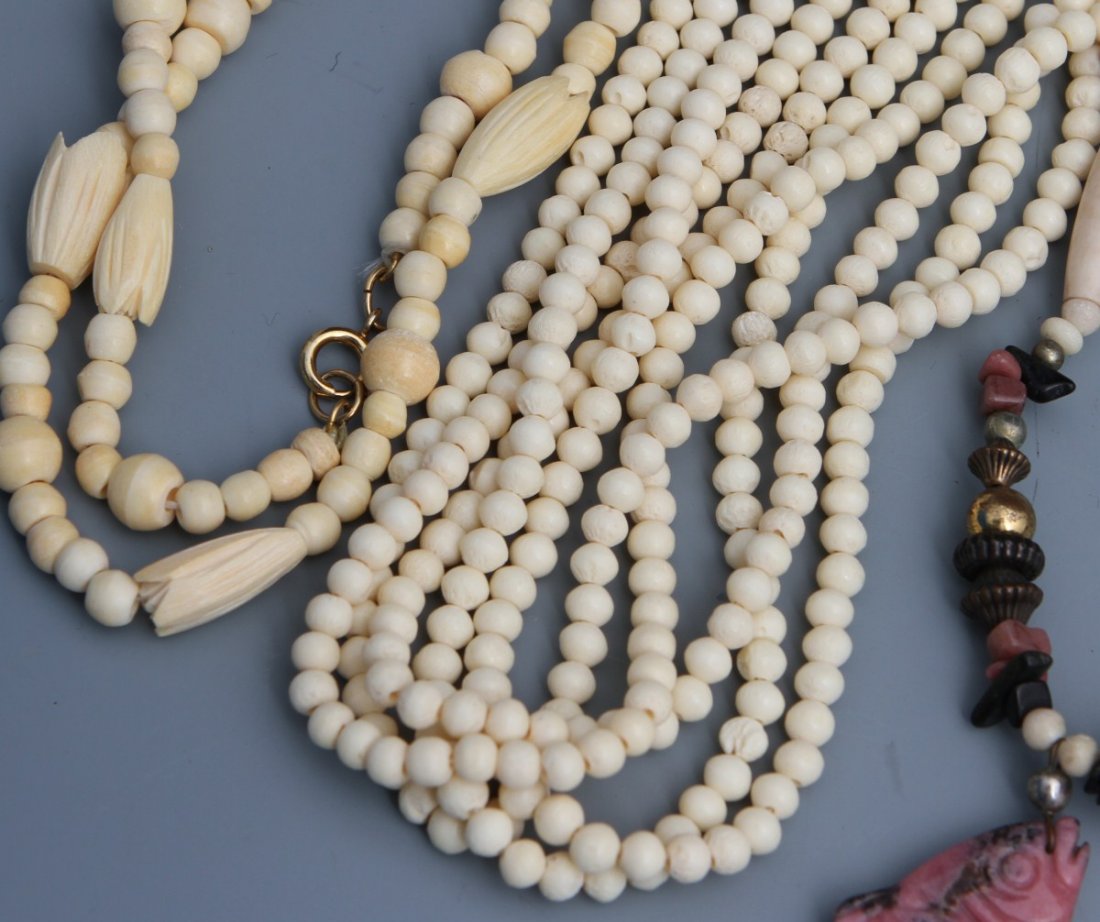 LARGE LOT OF BONE NECKLACES - 5