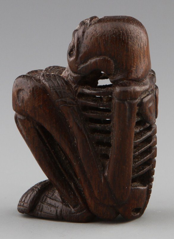 CARVED WOODEN NETSUKE OF A SKELETON - 2