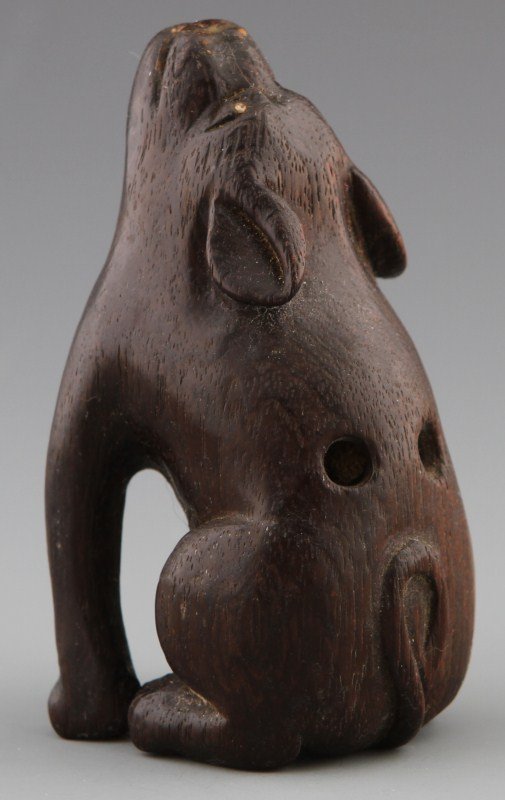 CARVED WOODEN NETSUKE OF HOWLING WOLF