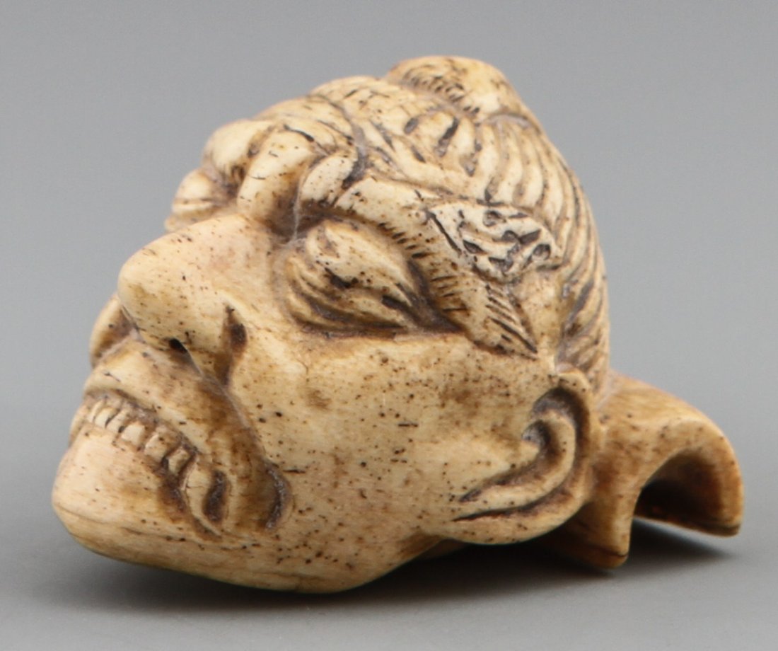 JAPANESE CARVED BONE NETSUKE YOSHISADA HEAD
