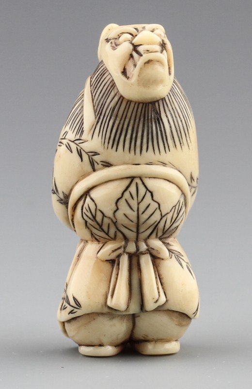 JAPANESE CARVED IVORY NETSUKE SAMURAI WITH SWORD