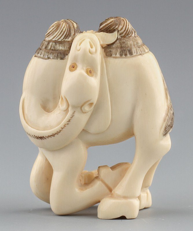 JAPANESE CARVED IVORY NETSUKE CAMEL