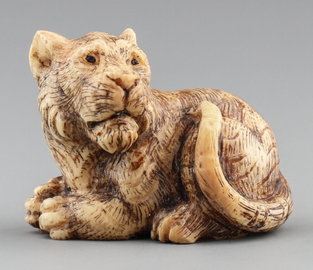 JAPANESE CARVED IVORY NETSUKE TIGER
