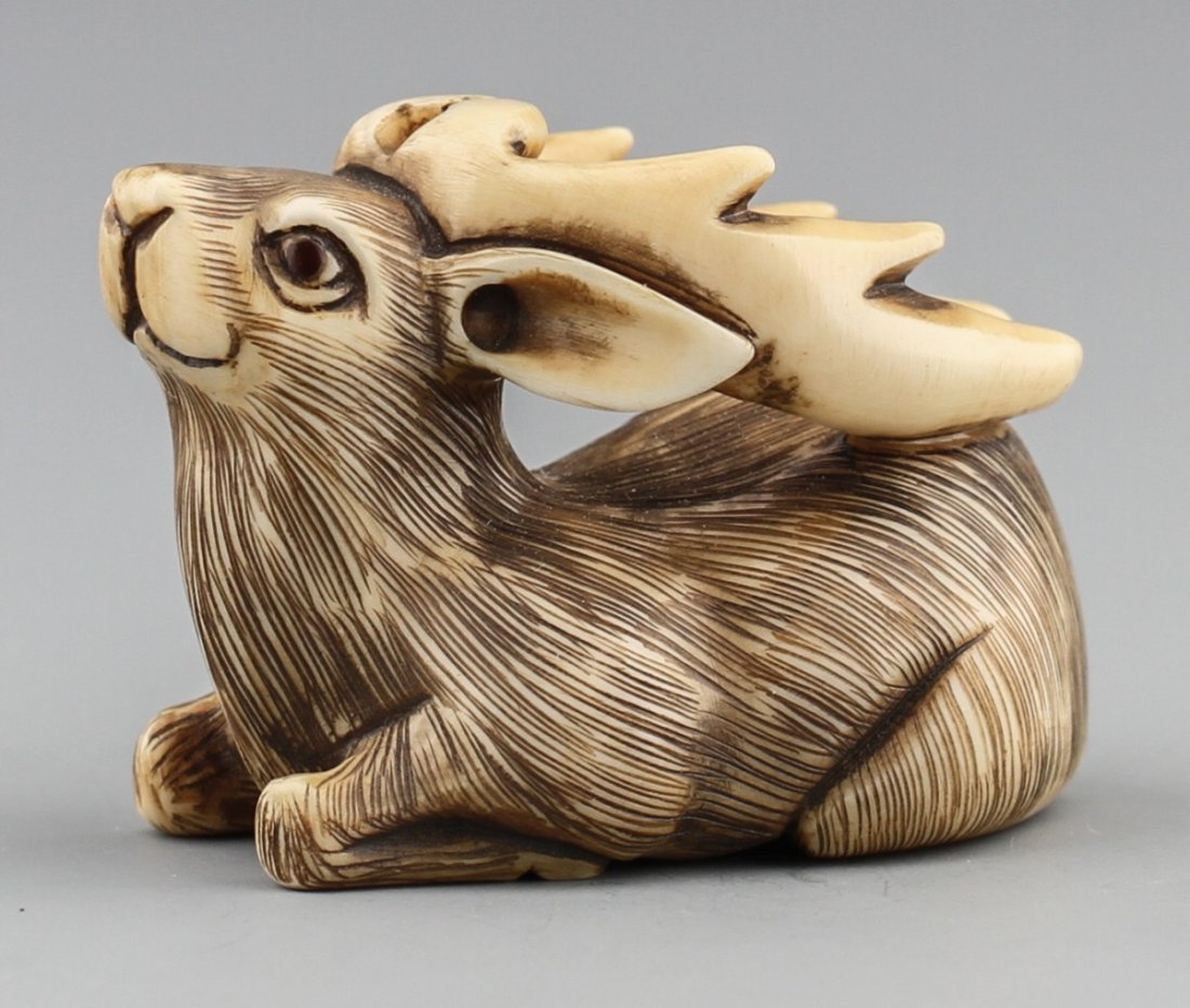 JAPANESE CARVED IVORY NETSUKE DEER BAISHO