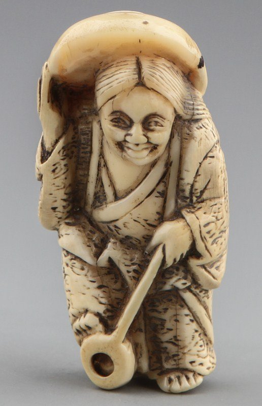 JAPANESE CARVED IVORY NETSUKE WOMAN