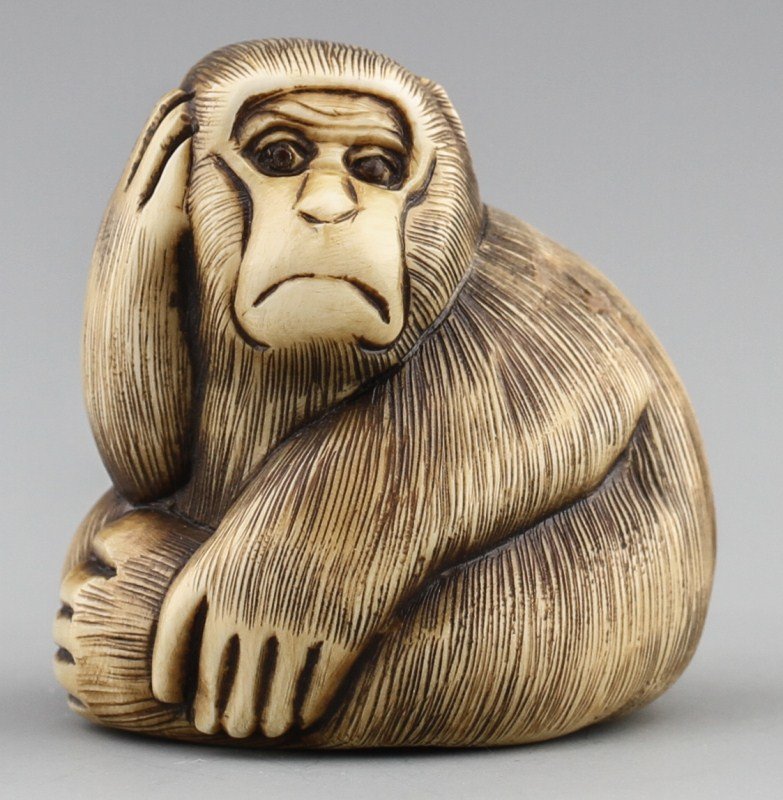 JAPANESE CARVED IVORY NETSUKE MONKEY