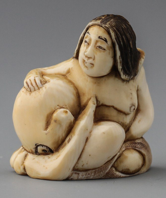 JAPANESE CARVED IVORY NETSUKE WOMAN & OCTOPUS
