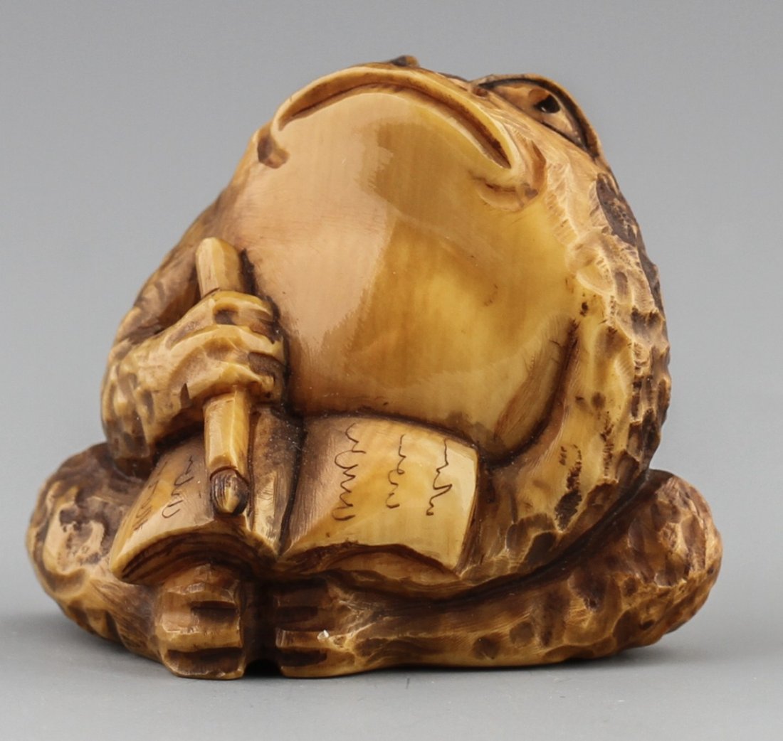 JAPANESE CARVED IVORY NETSUKE WRITING TOAD