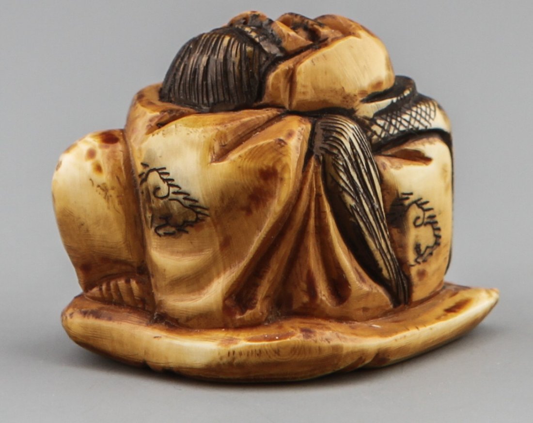JAPANESE CARVED IVORY NETSUKE FISHERMAN