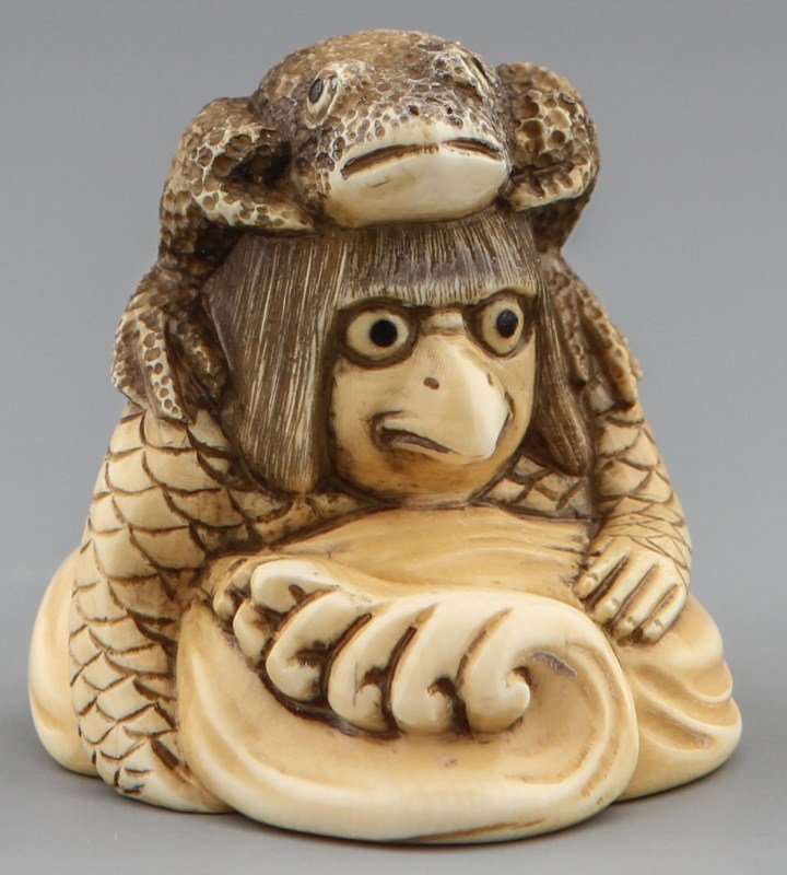 JAPANESE CARVED IVORY NETSUKE KAPPA: JAPANESE CARVED IVORY NETSUKE KAPPA Japanese carved ivory netsuke of a Kappa, Japanese river sprite, emerging from its watery home. Head, shoulders and arms are visible above a breaking wave base. Int