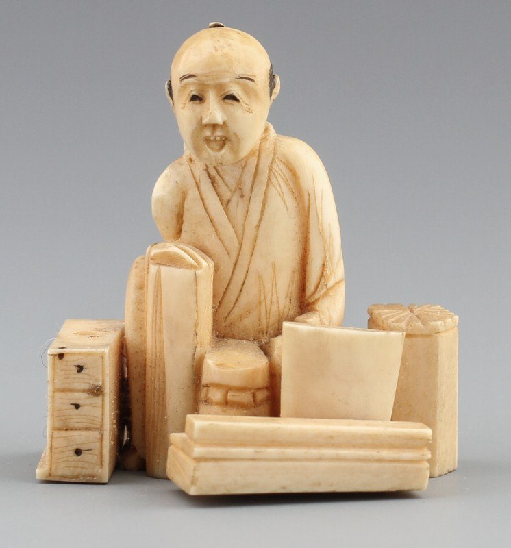 JAPANESE CARVED IVORY OKIMONO STREET VENDER