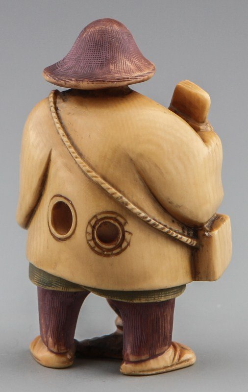 JAPANESE CARVED IVORY NETSUKE OF WOMAN WITH BOOKS - 2