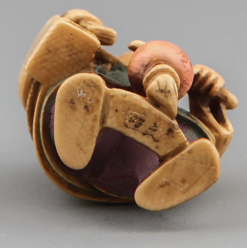 JAPANESE CARVED IVORY NETSUKE OF WOMAN WITH BOOKS - 3