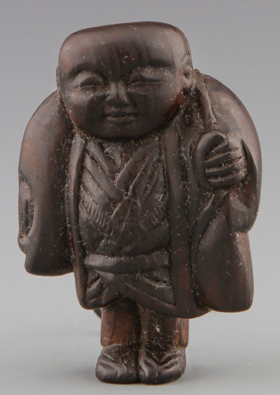 JAPANESE CARVED WOODEN NETSUKE MAN WITH MASK