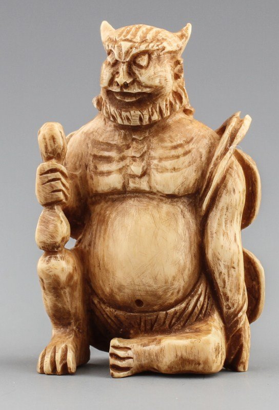 JAPANESE CARVED IVORY RAIJIN WITH DRUMS ON BACK
